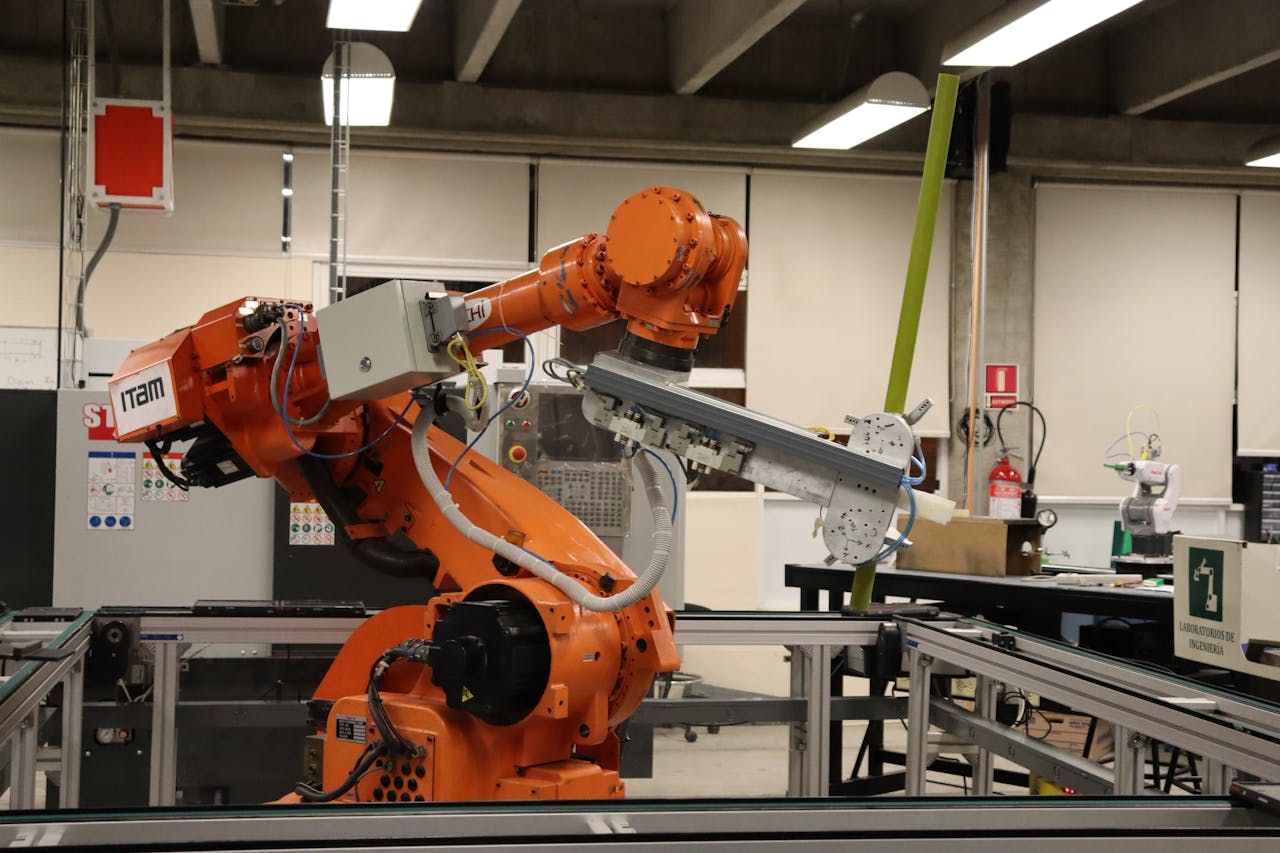 home-img Industrial robotic arm in a Ciudad de México lab setting, showcasing automation technology.